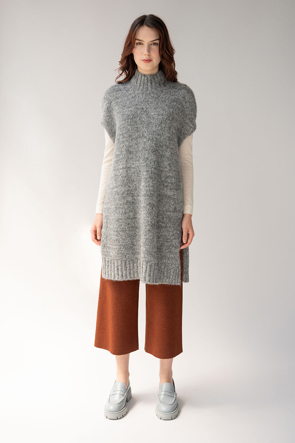 Long mock neck tunic vest in grey ivory made from alpaca length hits above knee
