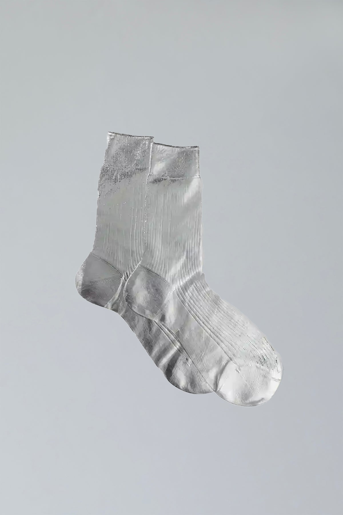 Maria La Rosa Lumine ribbed silk socks in metallic silver with a laminated sheen, mid-calf length