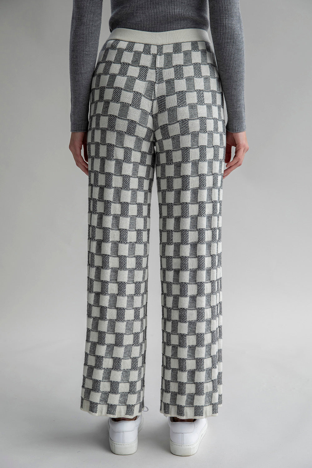 Back view of Zoe Trousers reversed, showcasing the lighter colorway and versatile design. Waistband is ivory.