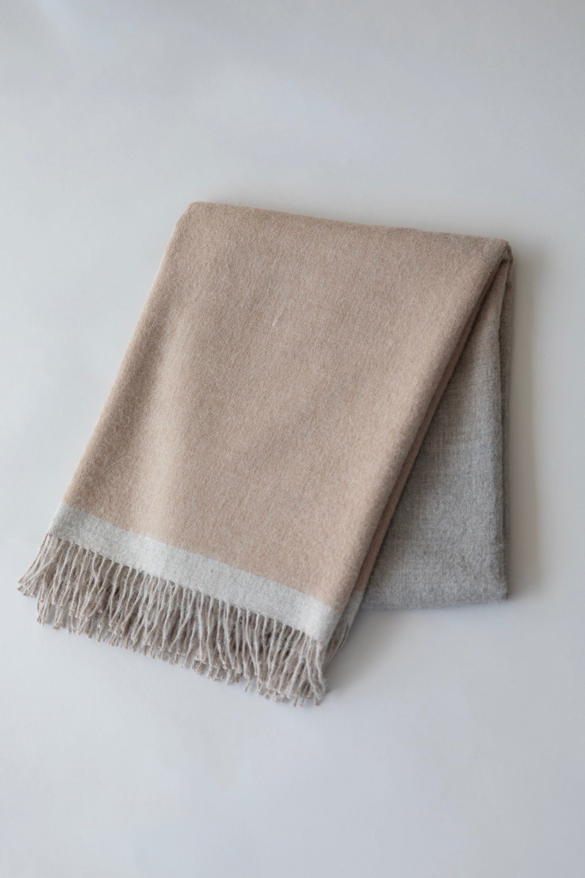GRADIENT WEAVE THROW - TAUPE