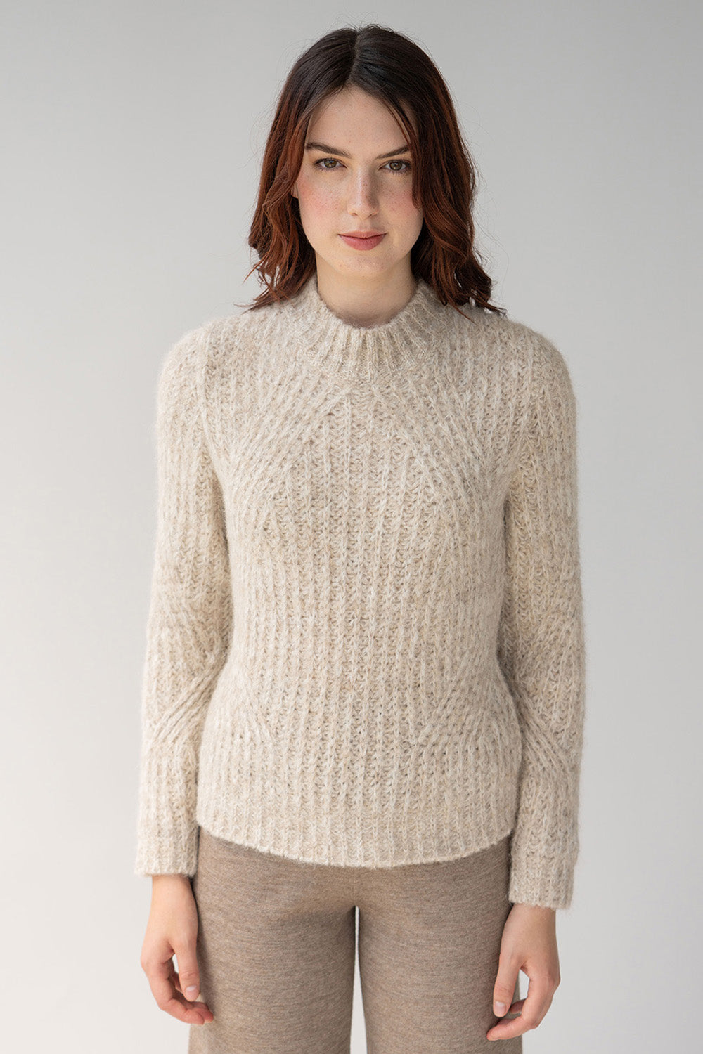 Vik transfer rib pullover in oat ivory marl made in Peru from alpaca features a rib stitch for a slimmer silhouette
