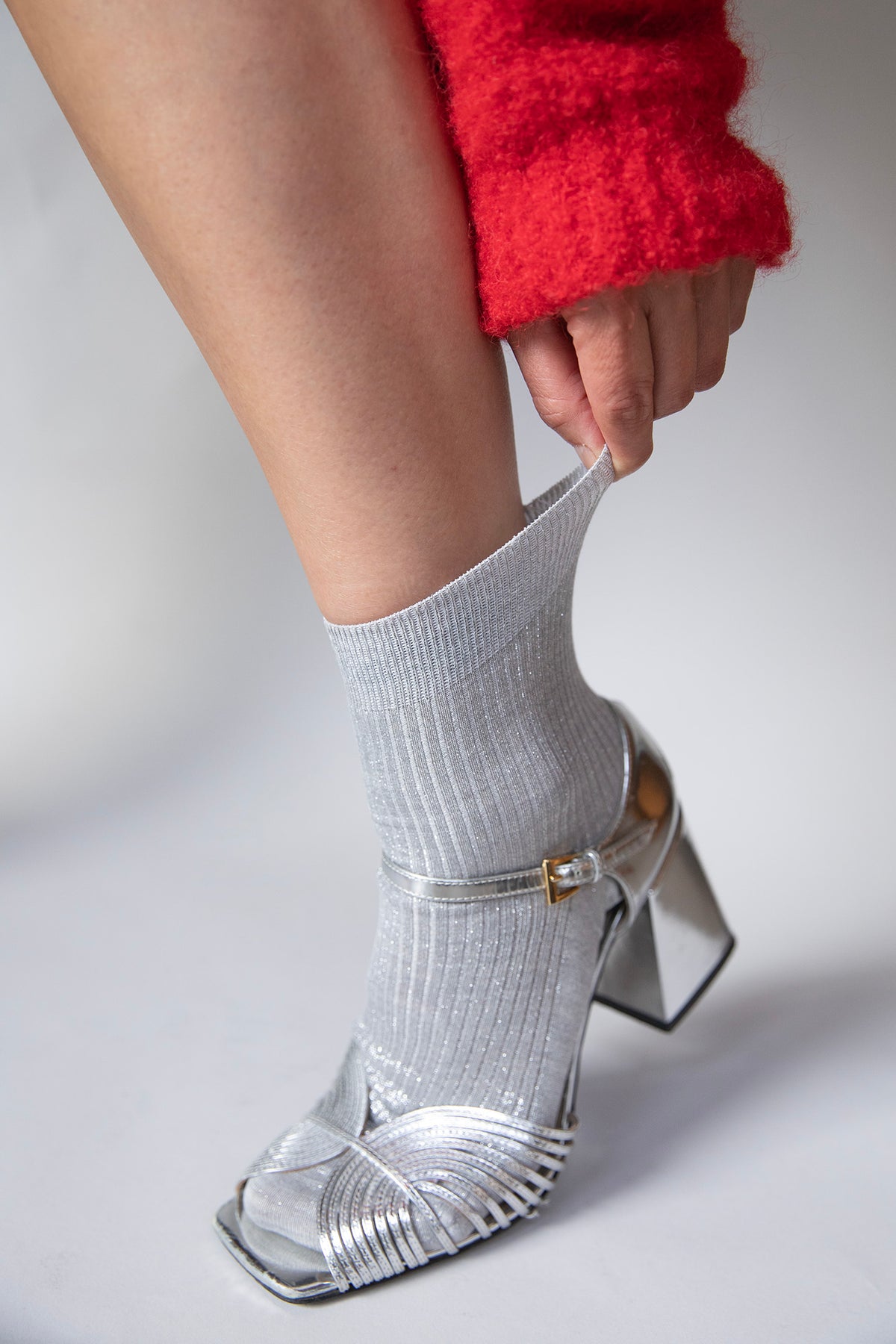 Pair of Maria La Rosa Lumine laminated silk socks in silver, flat lay